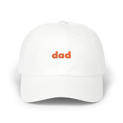White cap with 'dad' embroidered in orange on a white background