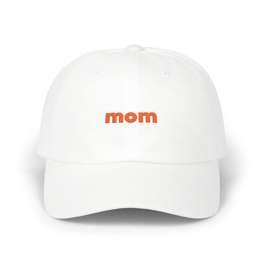 White cap with 'mom' embroidered in orange on a white background