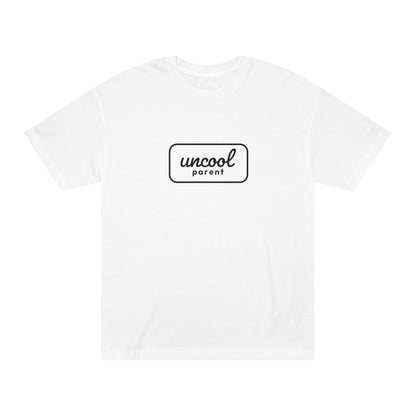 White t-shirt with 'uncool parent' text on a white background