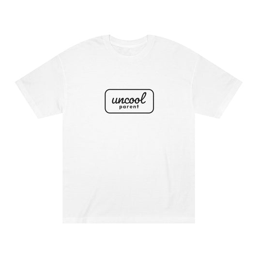 White t-shirt with 'uncool parent' text on a white background