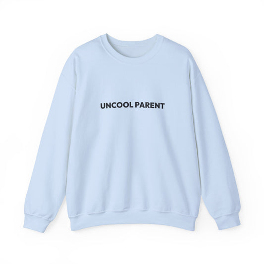 Light blue sweatshirt with 'UNCOOL PARENT' text on a white background