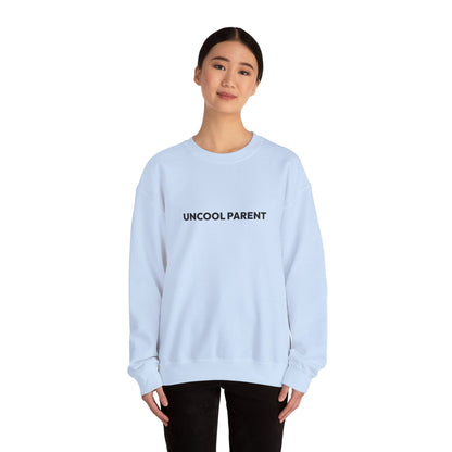 Person wearing a light pink sweatshirt on a white background